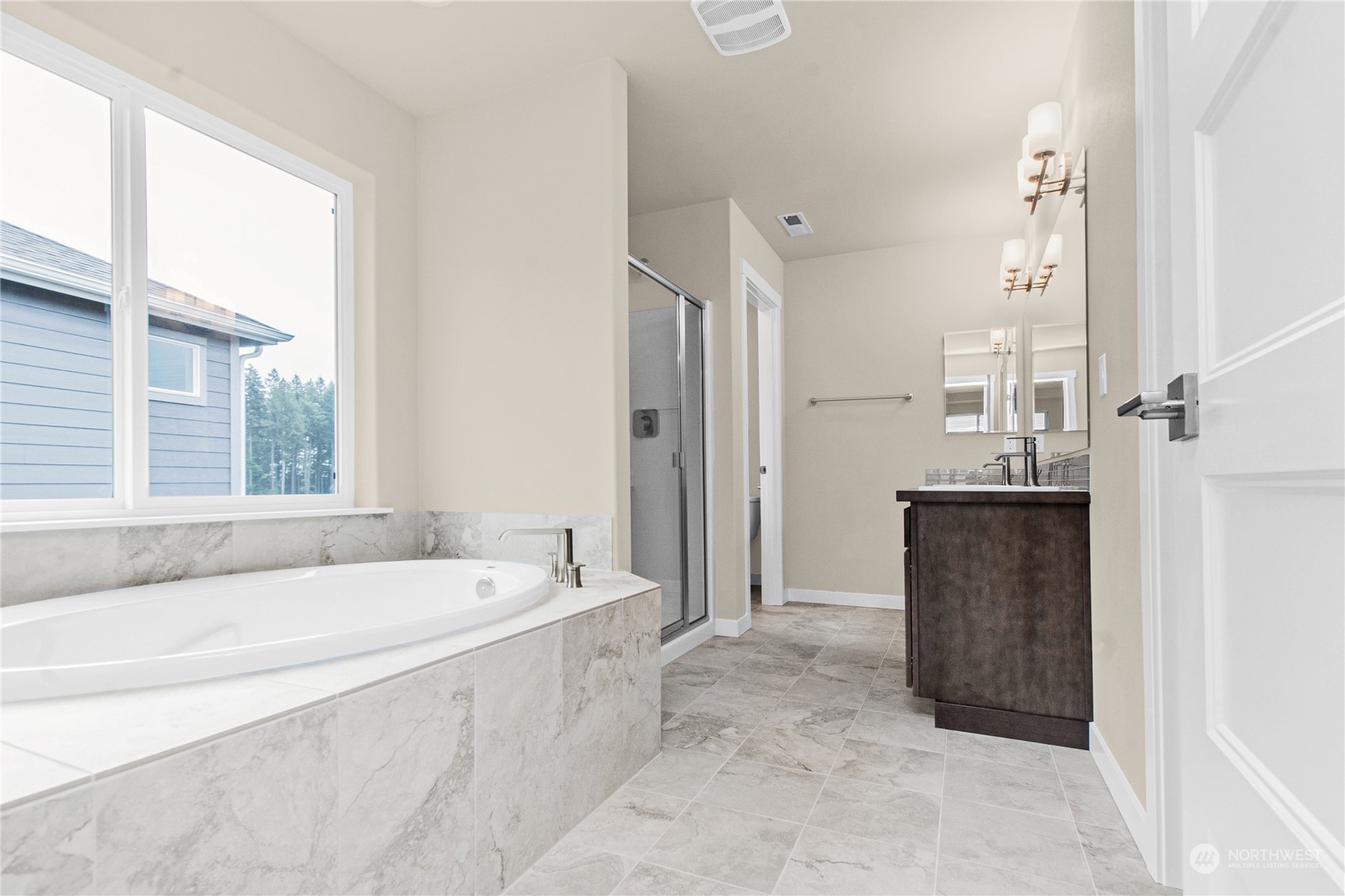 9741 7th Way Southeast Lacey, WA 98513 - Photo 28 of 40 a spacious bathroom with sink shower and bathtub