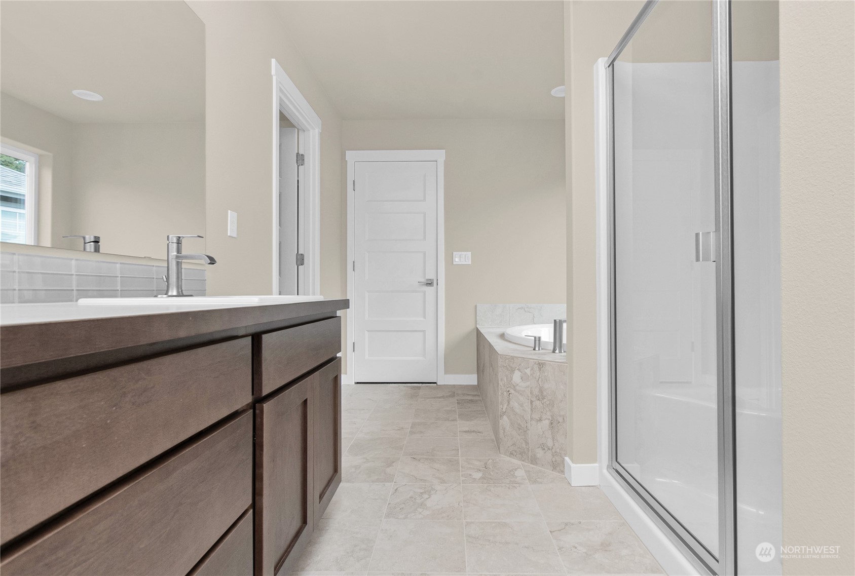 9741 7th Way Southeast Lacey, WA 98513 - Photo 29 of 40 a bathroom with a sink and a mirror