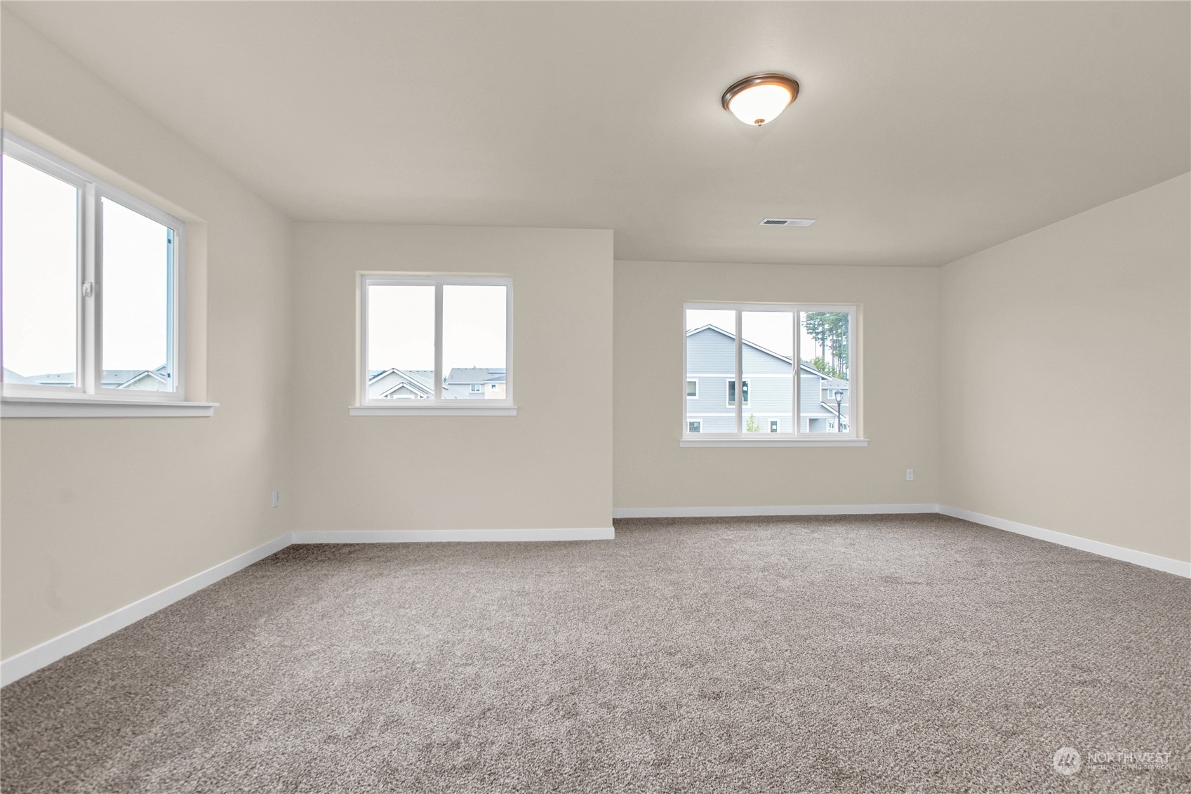 9741 7th Way Southeast Lacey, WA 98513 - Photo 33 of 40 an empty room with windows