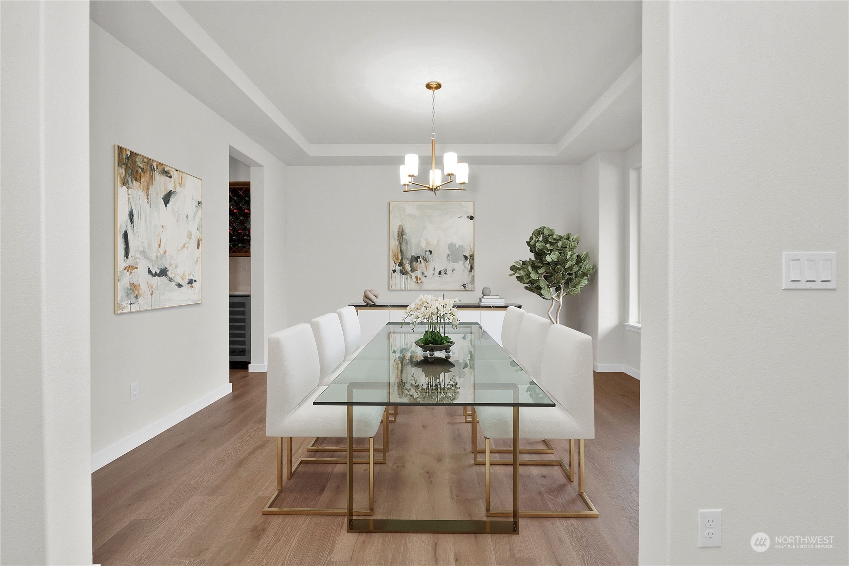 9741 7th Way Southeast Lacey, WA 98513 - Photo 8 of 40 a view of a dining room with furniture and wooden floor