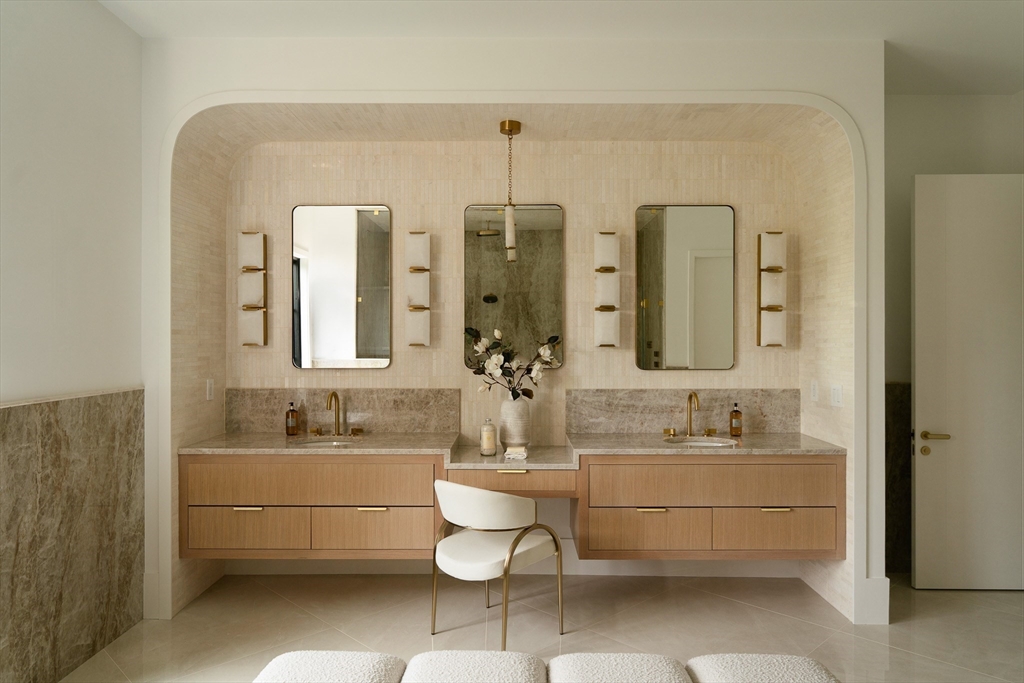 19 Bonnybrook Road Newton, MA 02468 - Photo 28 of 42 a bathroom with a double vanity sink mirror and bathtub