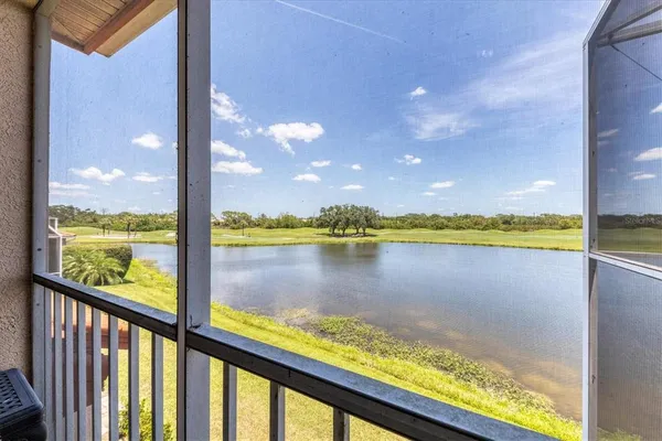 a view of a lake from a balcony