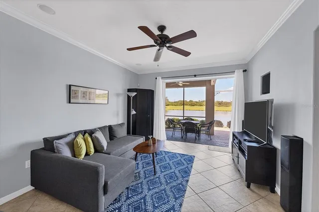 a living room with fireplace furniture and a flat screen tv