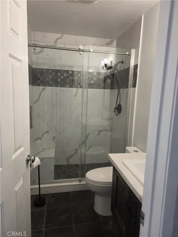 an empty room with a empty space and windows