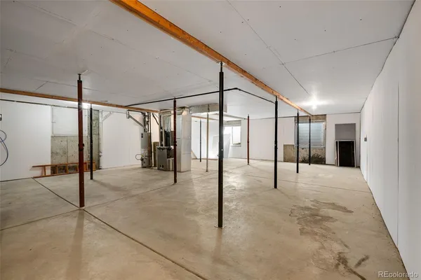 a view of an empty room with glass door