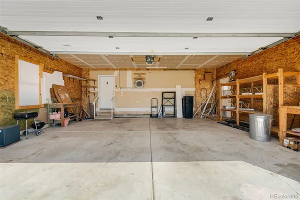 a view of a garage with gym equipment