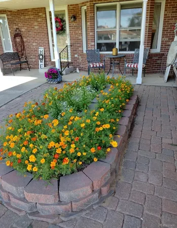 a view of a tables and chairs in patio