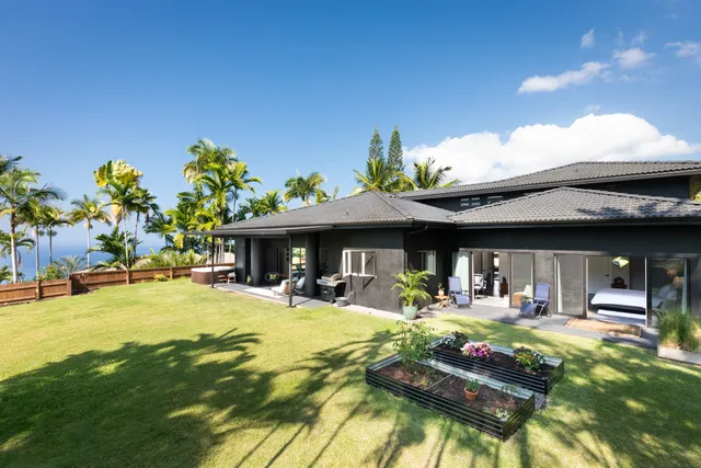 a swimming pool covered with outdoor seating