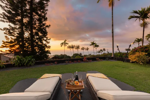a view of a patio with a yard