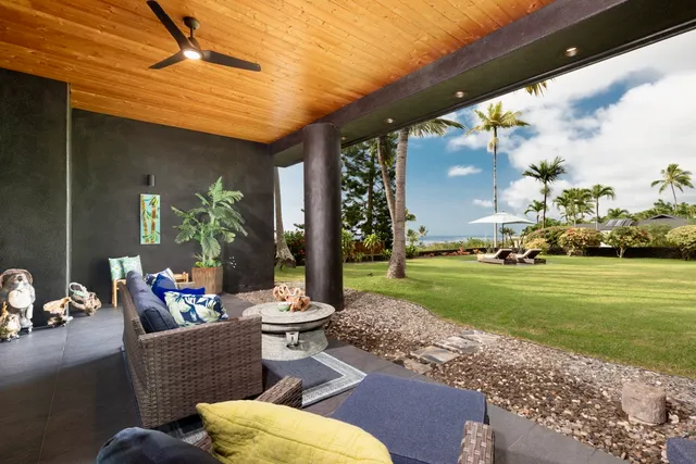 a outdoor living space with furniture and garden view