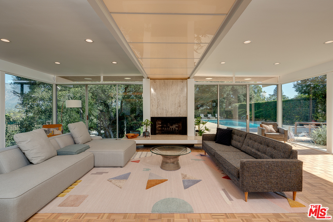 1490 El Mirador Drive Pasadena, CA 91103 - Photo 4 of 52 a living room with furniture and a large window