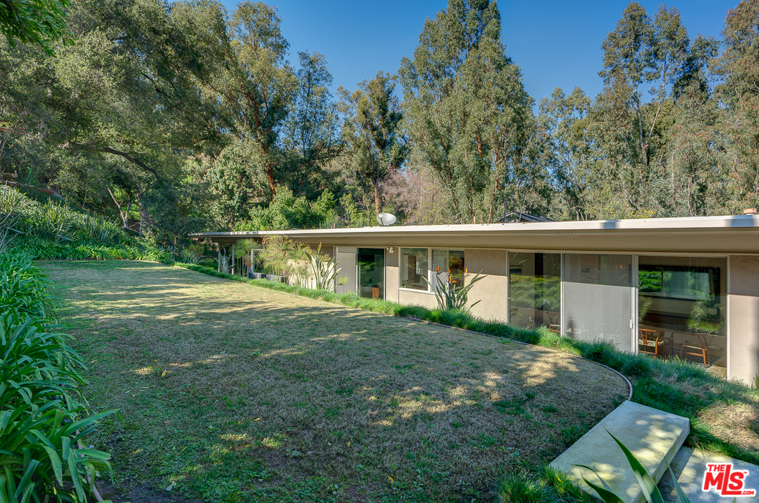 1490 El Mirador Drive Pasadena, CA 91103 - Photo 38 of 52 a view of a house with yard and a garden