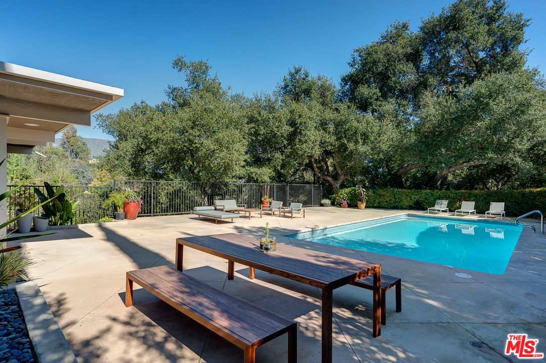 1490 El Mirador Drive Pasadena, CA 91103 - Photo 40 of 52 a view of a backyard with sitting area