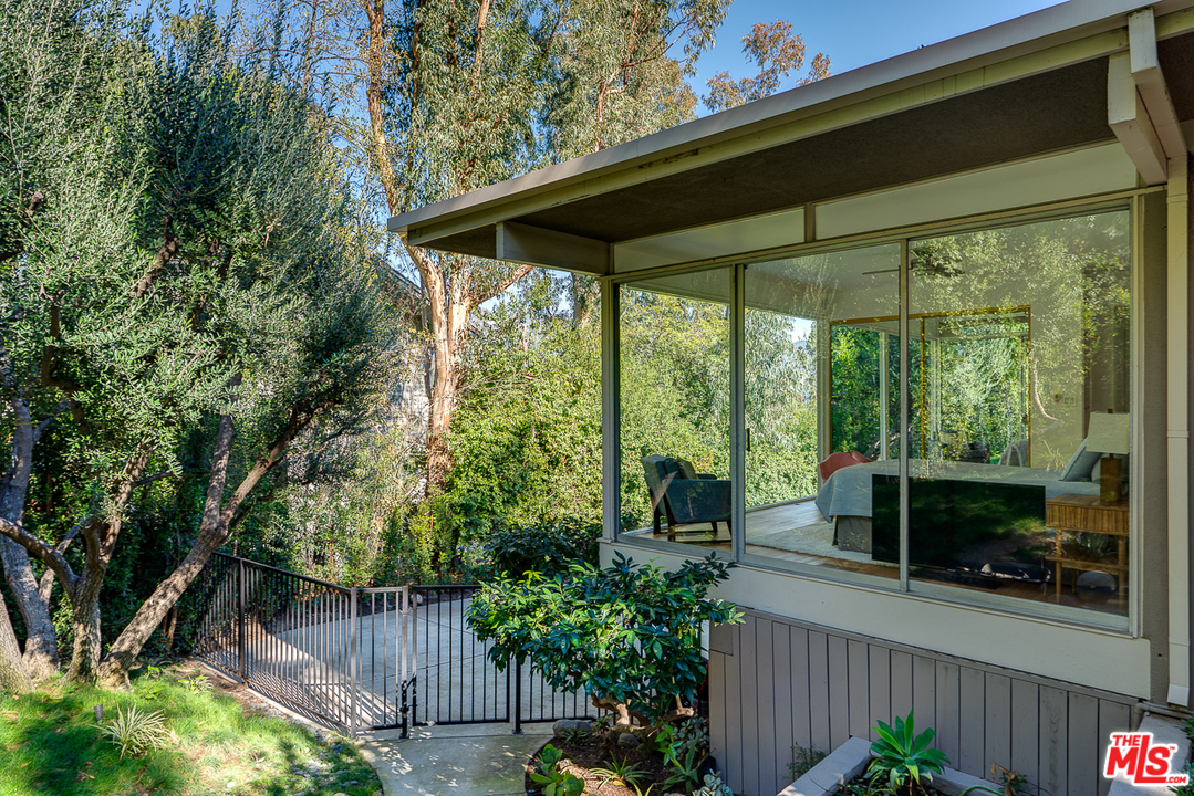 1490 El Mirador Drive Pasadena, CA 91103 - Photo 44 of 52 a view of a chair and table in the balcony