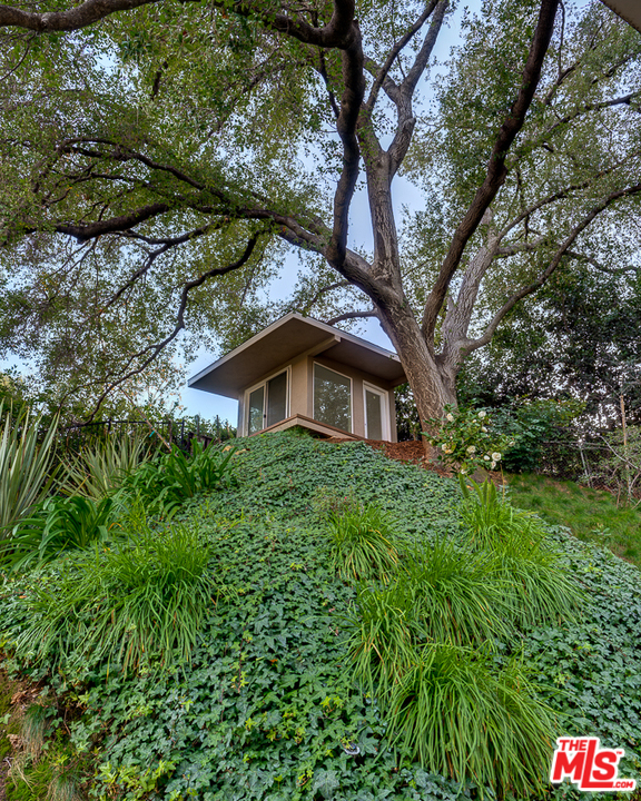 1490 El Mirador Drive Pasadena, CA 91103 - Photo 45 of 52 a front view of a house with a yard