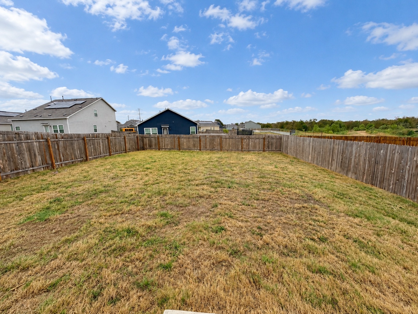 14409 Treyvon Road Manor, TX 78653 - Photo 18 of 21 Another view of the spacious private and fenced in backyard!