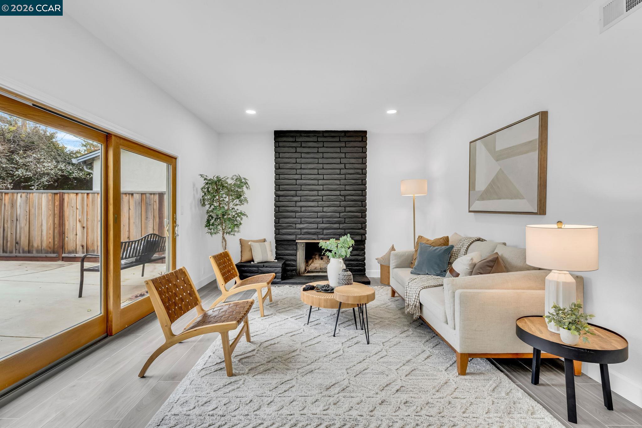 1548 Dianda Drive Concord, CA 94521 - Photo 26 of 59 a living room with furniture and a table