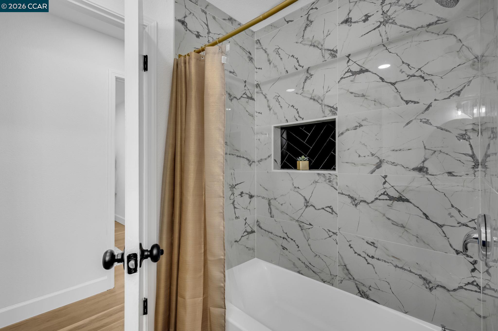 1548 Dianda Drive Concord, CA 94521 - Photo 33 of 59 a bathroom with a shower and a sink