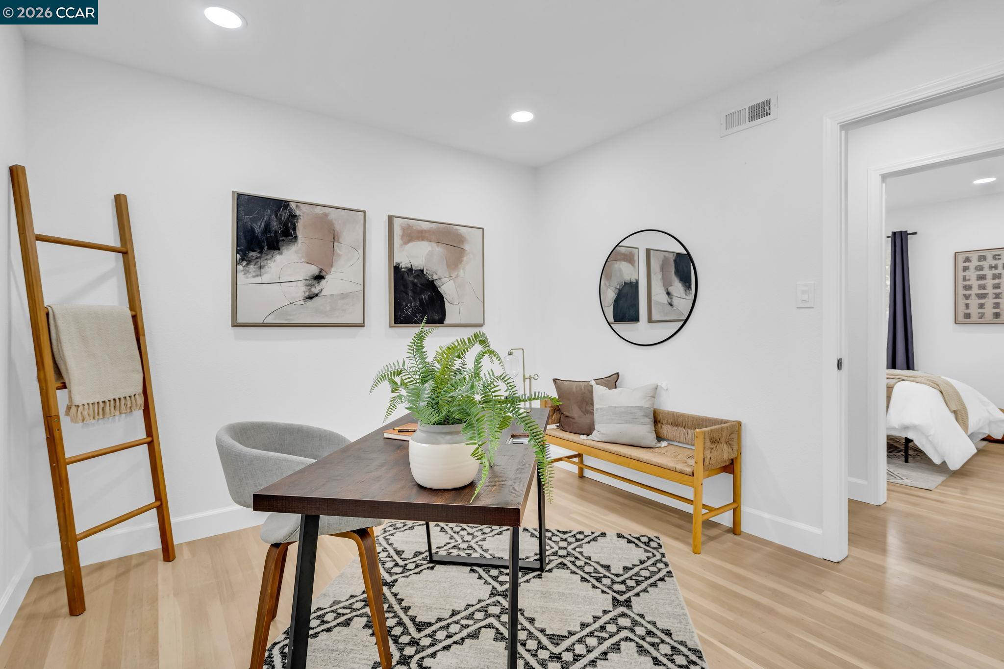 1548 Dianda Drive Concord, CA 94521 - Photo 39 of 59 a living room with furniture and a wooden floor