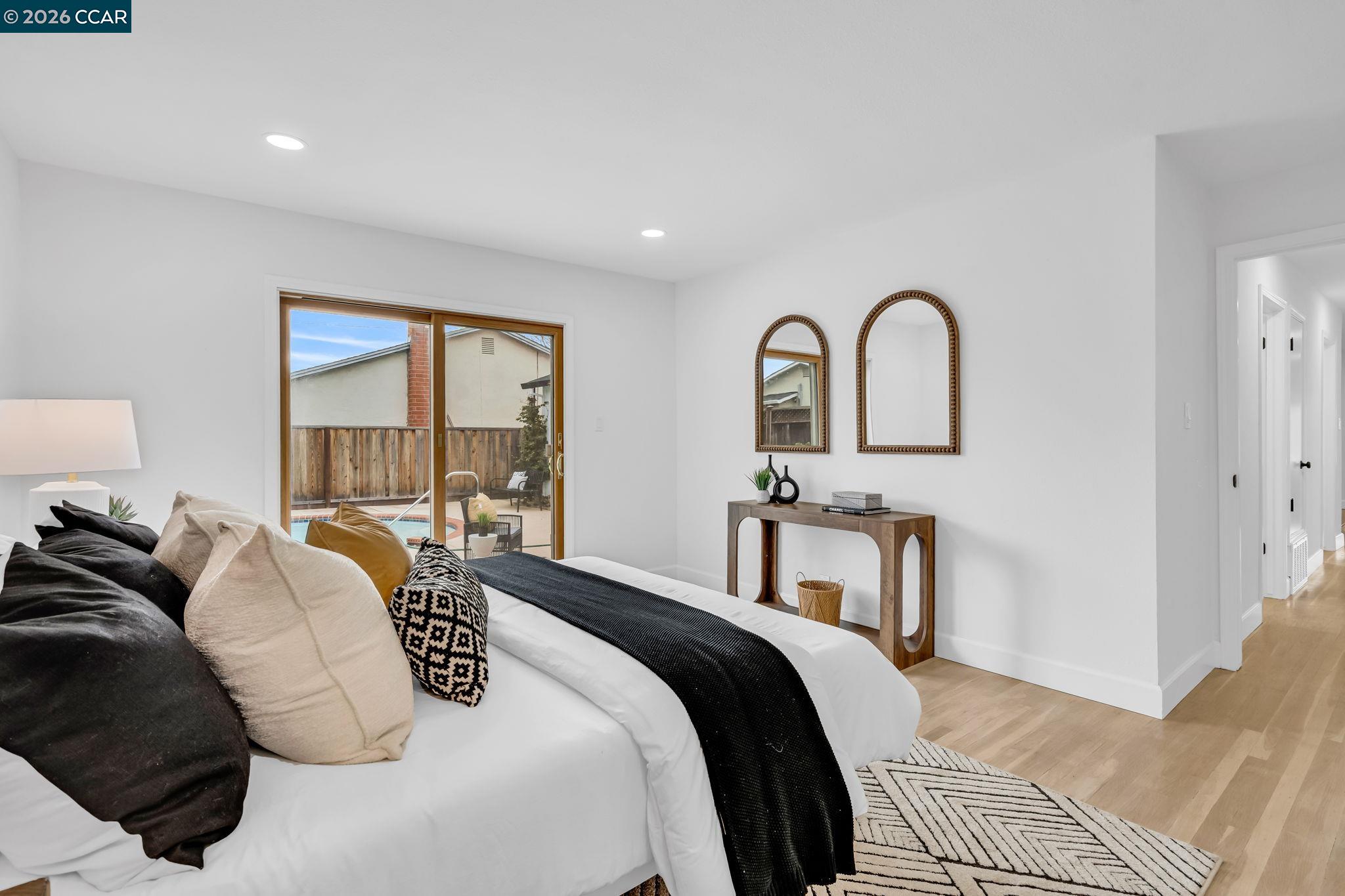 1548 Dianda Drive Concord, CA 94521 - Photo 48 of 59 a bedroom with a bed and a dresser