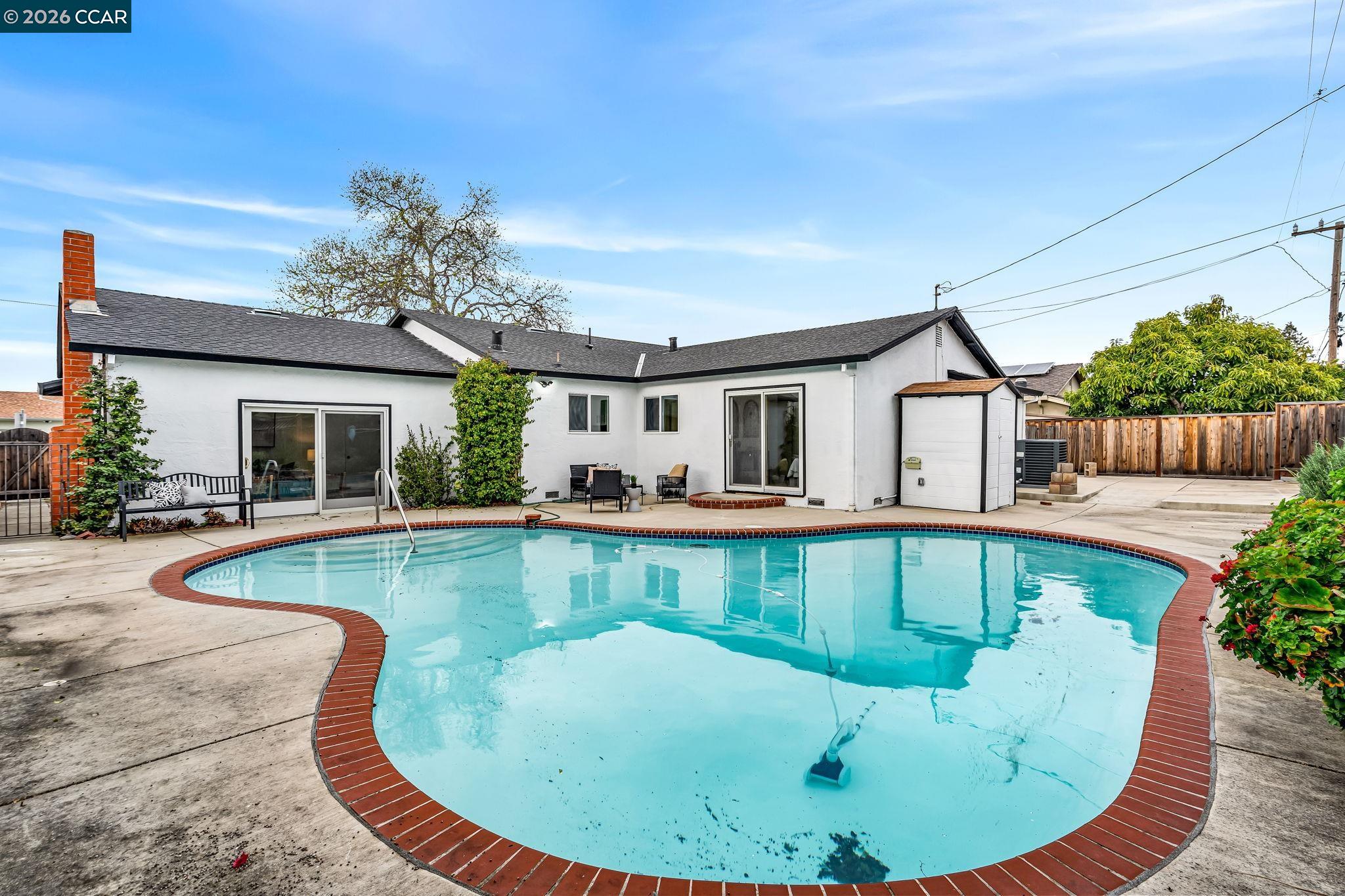 1548 Dianda Drive Concord, CA 94521 - Photo 59 of 59 a view of a house with swimming pool