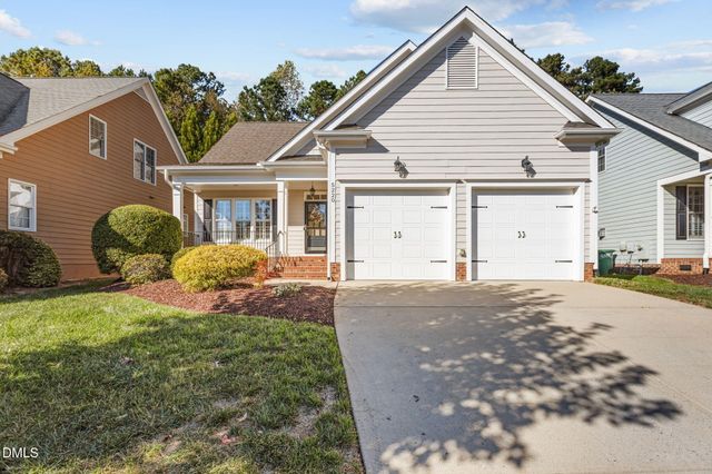 a house with trees in front of it