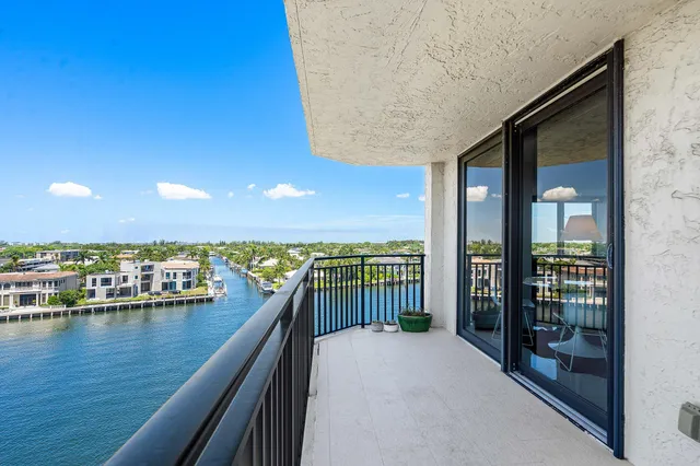a view of a balcony with an ocean