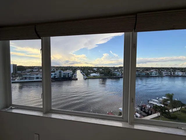 a view of a balcony next to a lake view