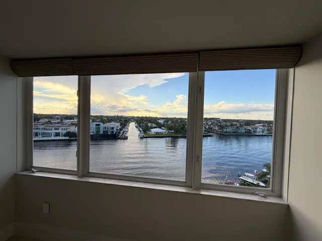 a view of a glass door with a balcony