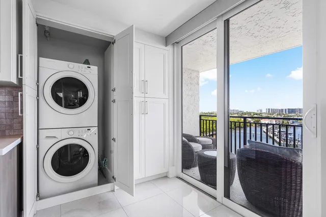 a view of a hallway with washer and dryer