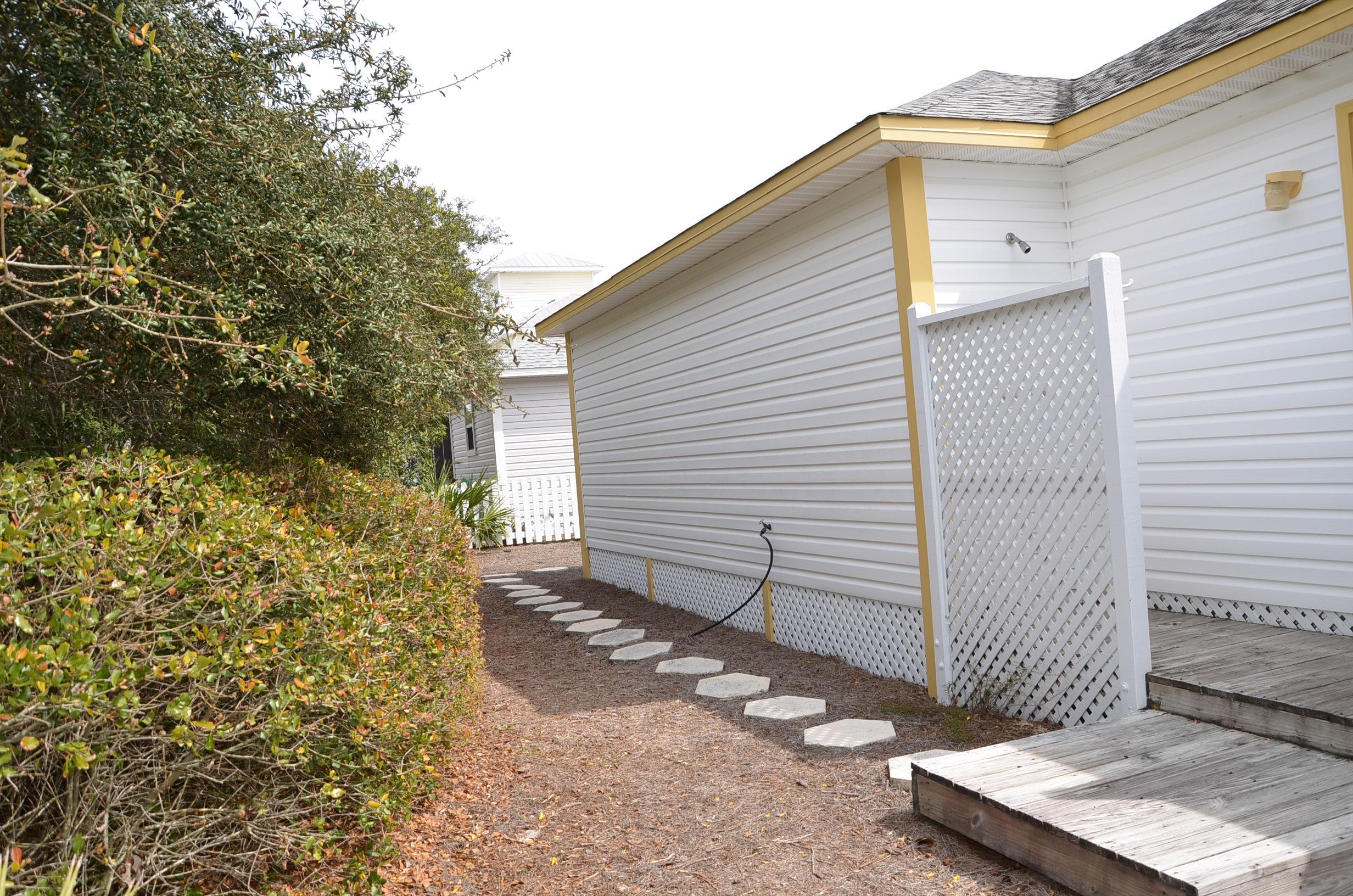 4456 Clipper Cove Destin, FL 32541 - Photo 22 of 31 a view of a house with a yard