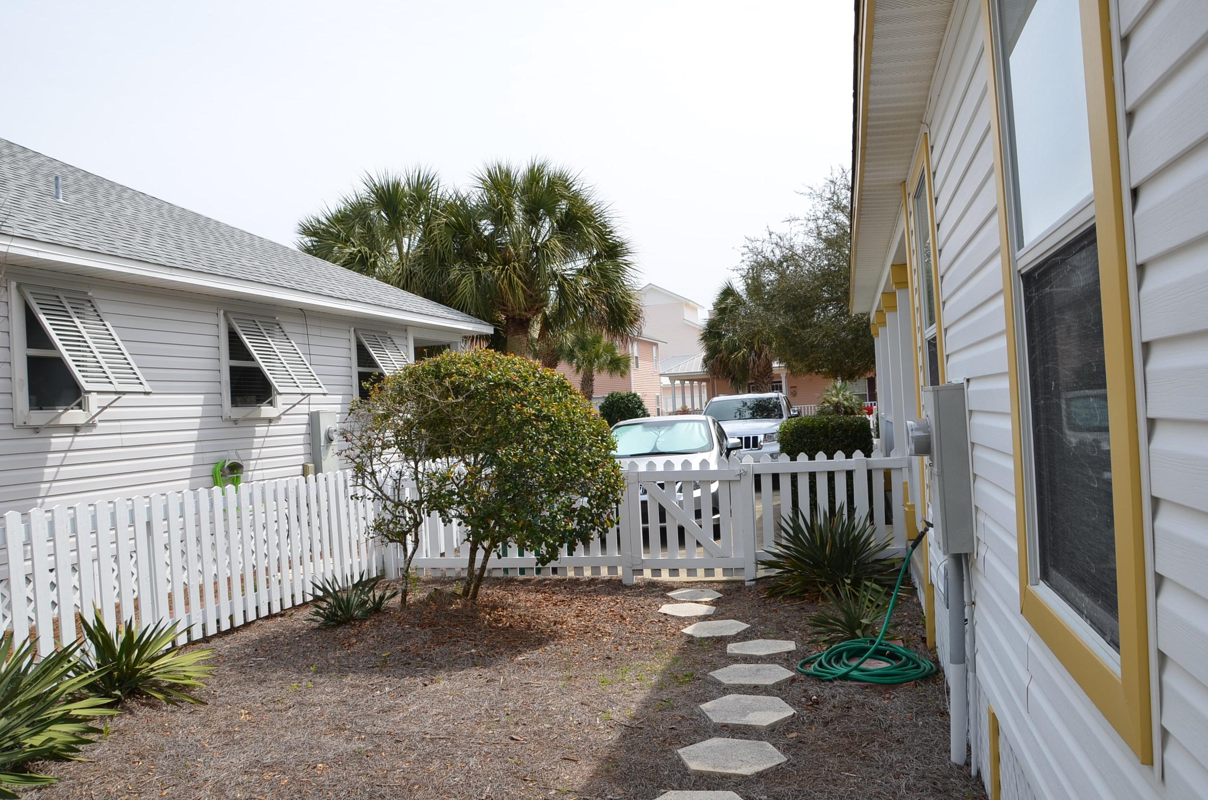 4456 Clipper Cove Destin, FL 32541 - Photo 23 of 31 a view of a house with a yard