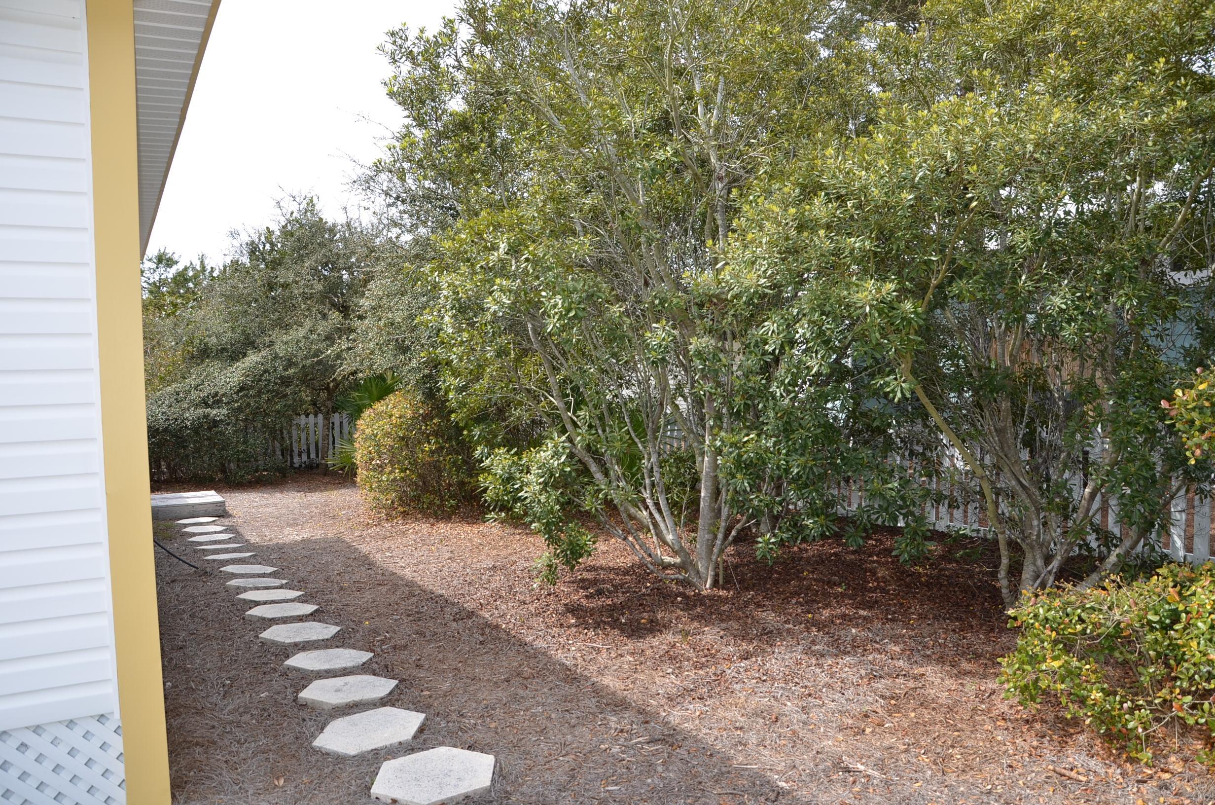 4456 Clipper Cove Destin, FL 32541 - Photo 24 of 31 a view of a yard with trees