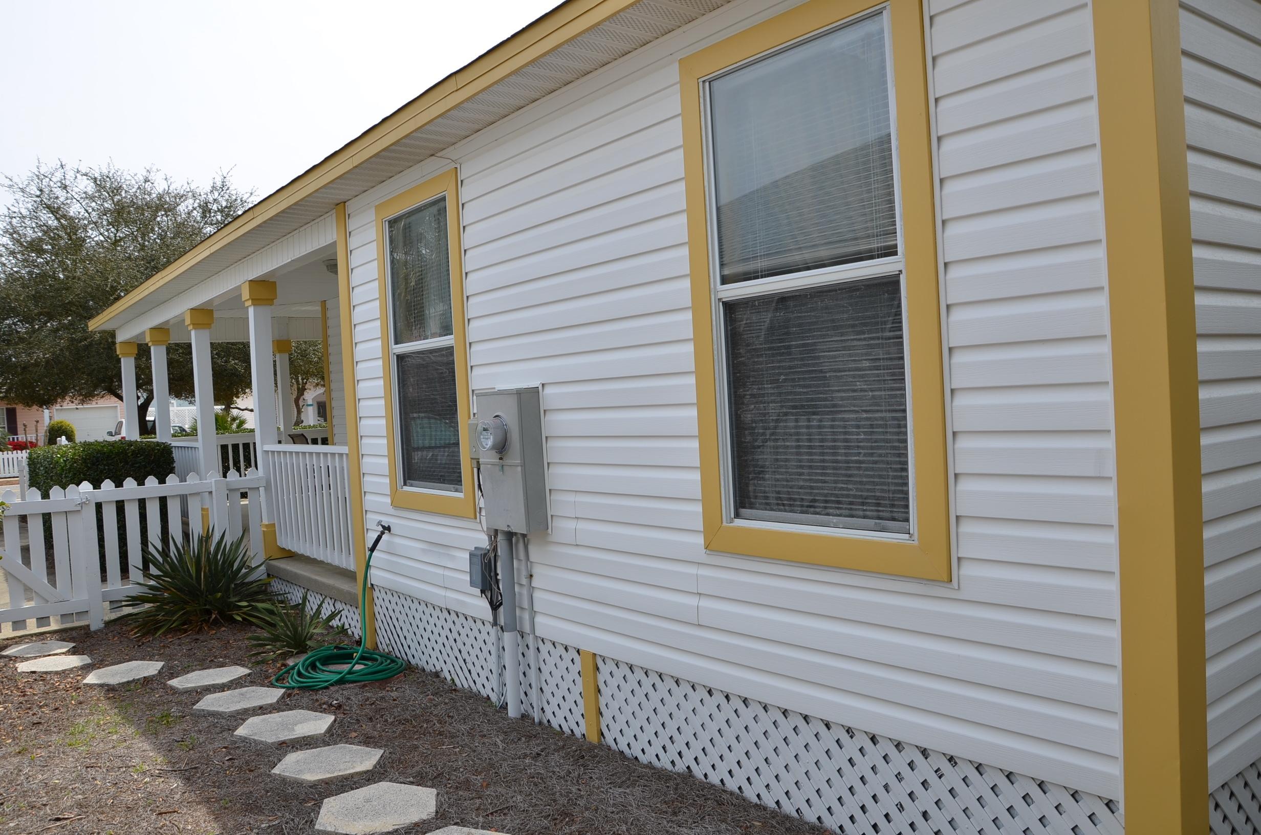 4456 Clipper Cove Destin, FL 32541 - Photo 25 of 31 a view of a house with a small porch