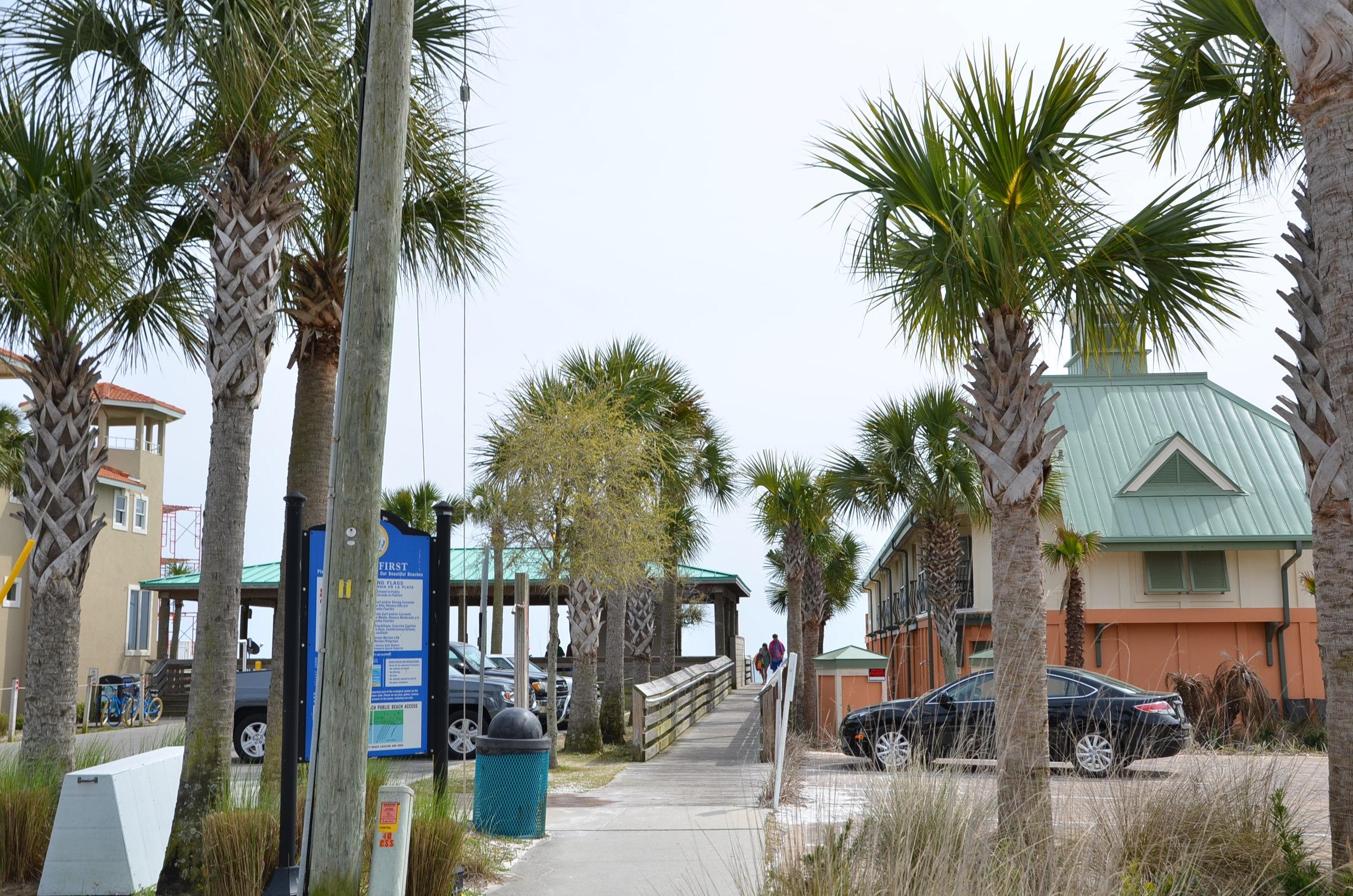 4456 Clipper Cove Destin, FL 32541 - Photo 30 of 31 a front view of a house with tree s