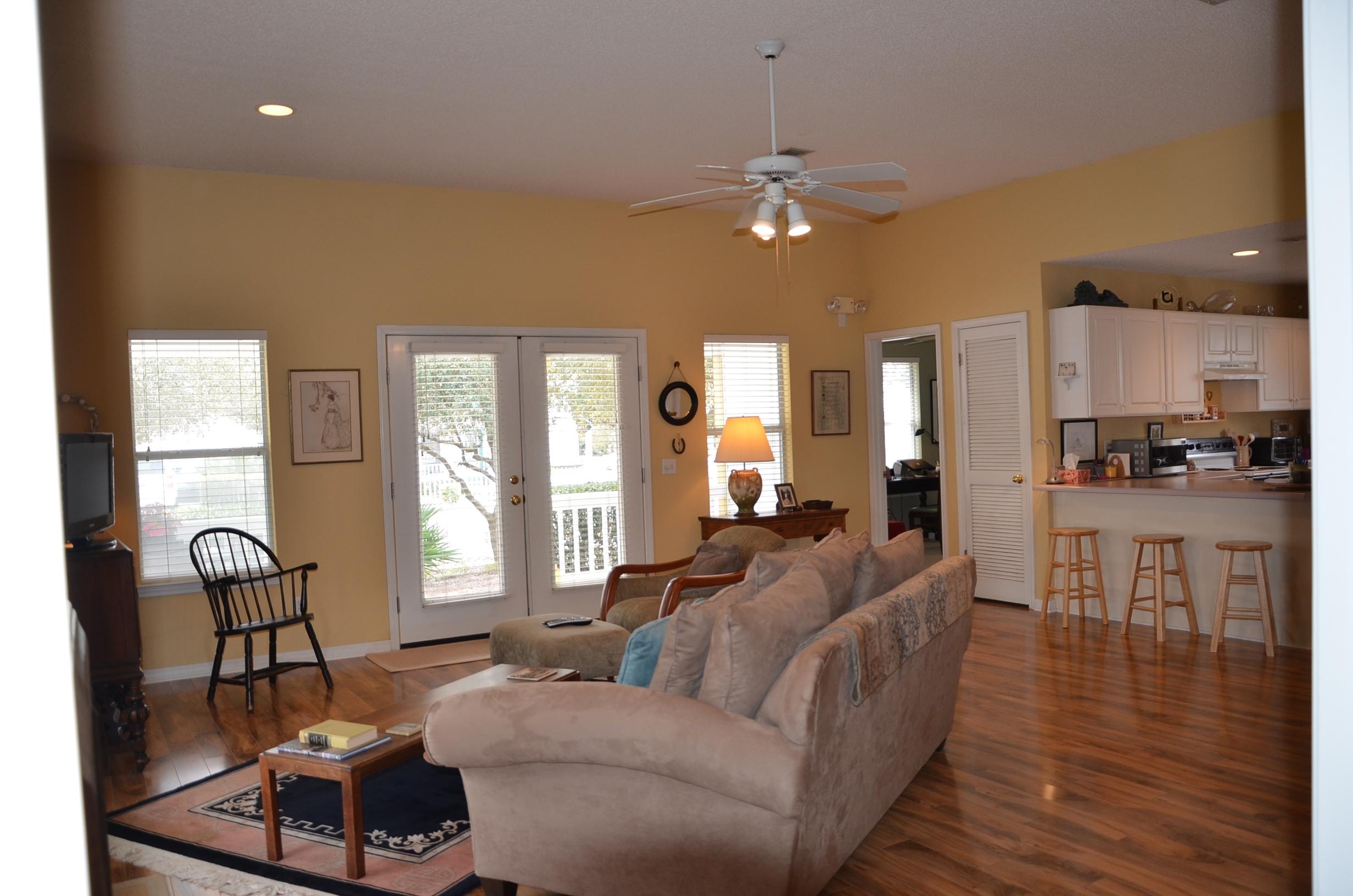 4456 Clipper Cove Destin, FL 32541 - Photo 6 of 31 a living room with furniture and a large window