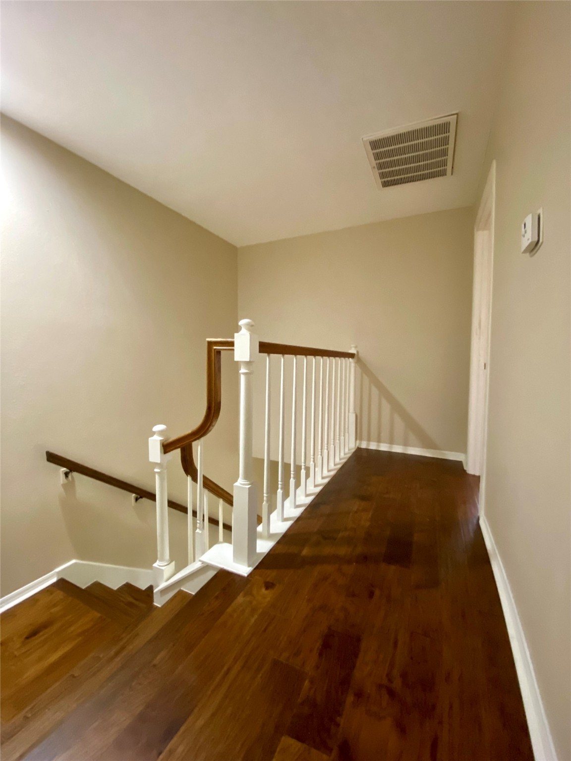 752 Augusta Drive Houston, TX 77057 - Photo 21 of 39 a view of entryway with wooden floor