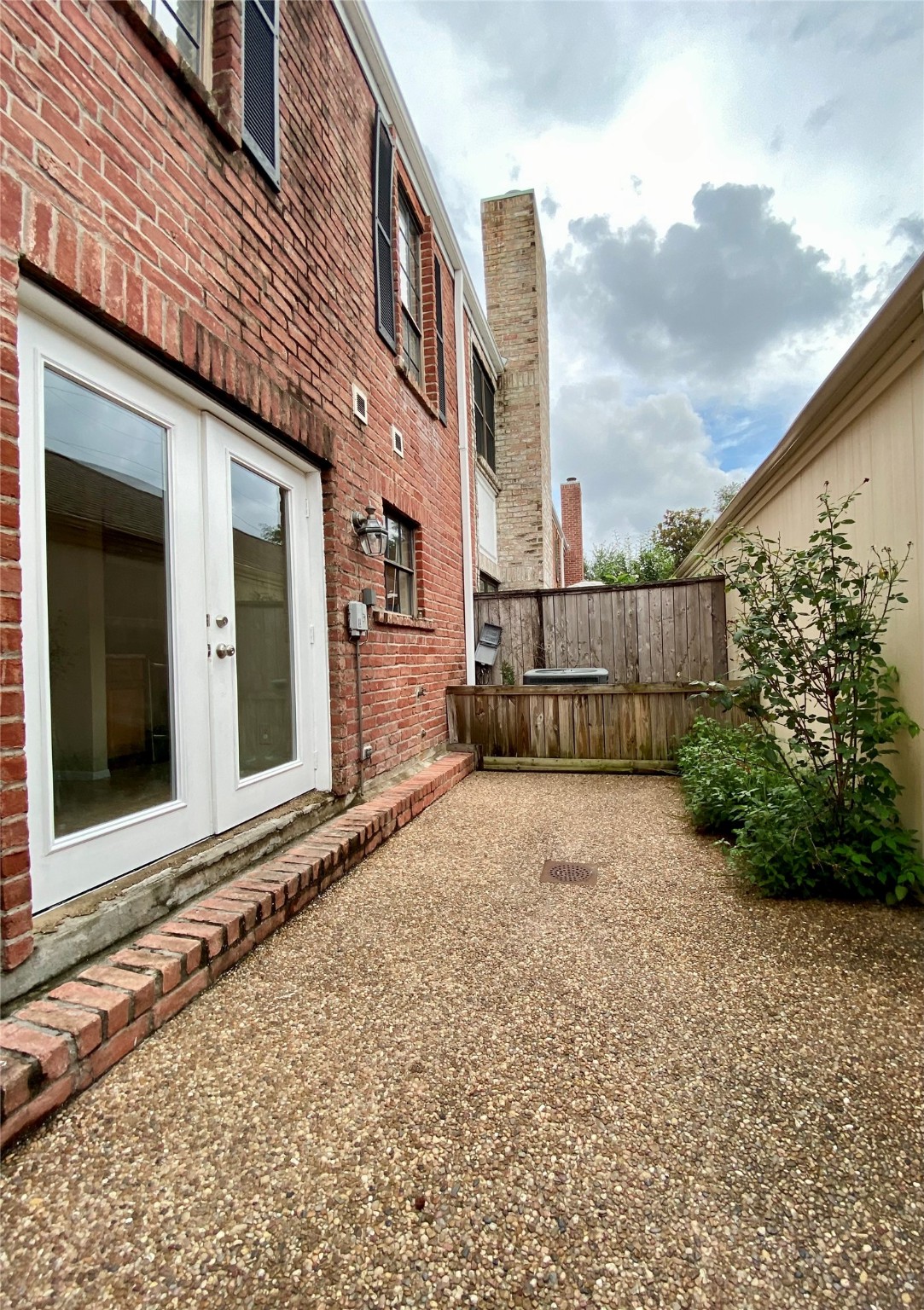 752 Augusta Drive Houston, TX 77057 - Photo 31 of 39 a view of a brick house with many windows