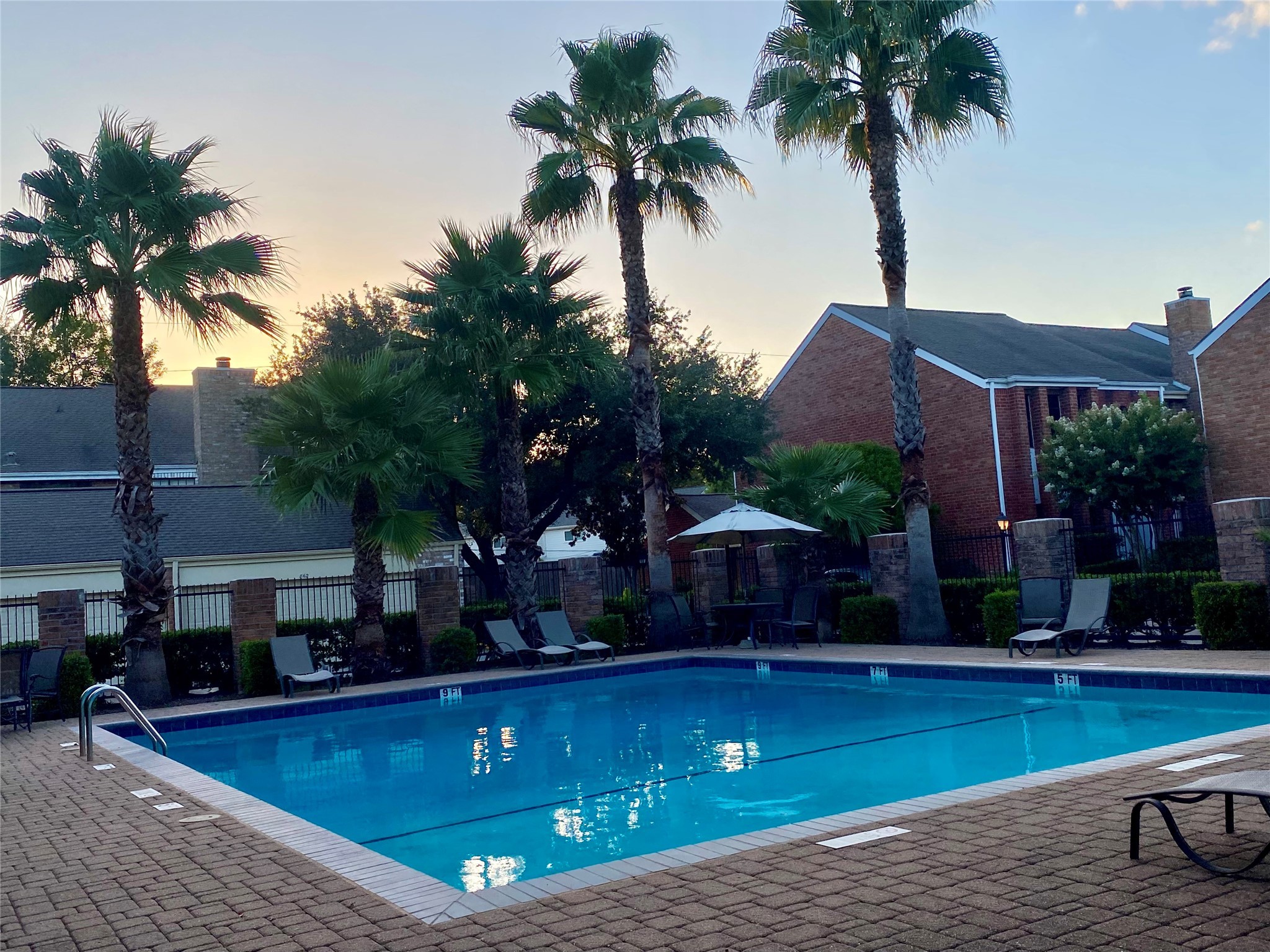 752 Augusta Drive Houston, TX 77057 - Photo 35 of 39 a swimming pool with outdoor seating and yard