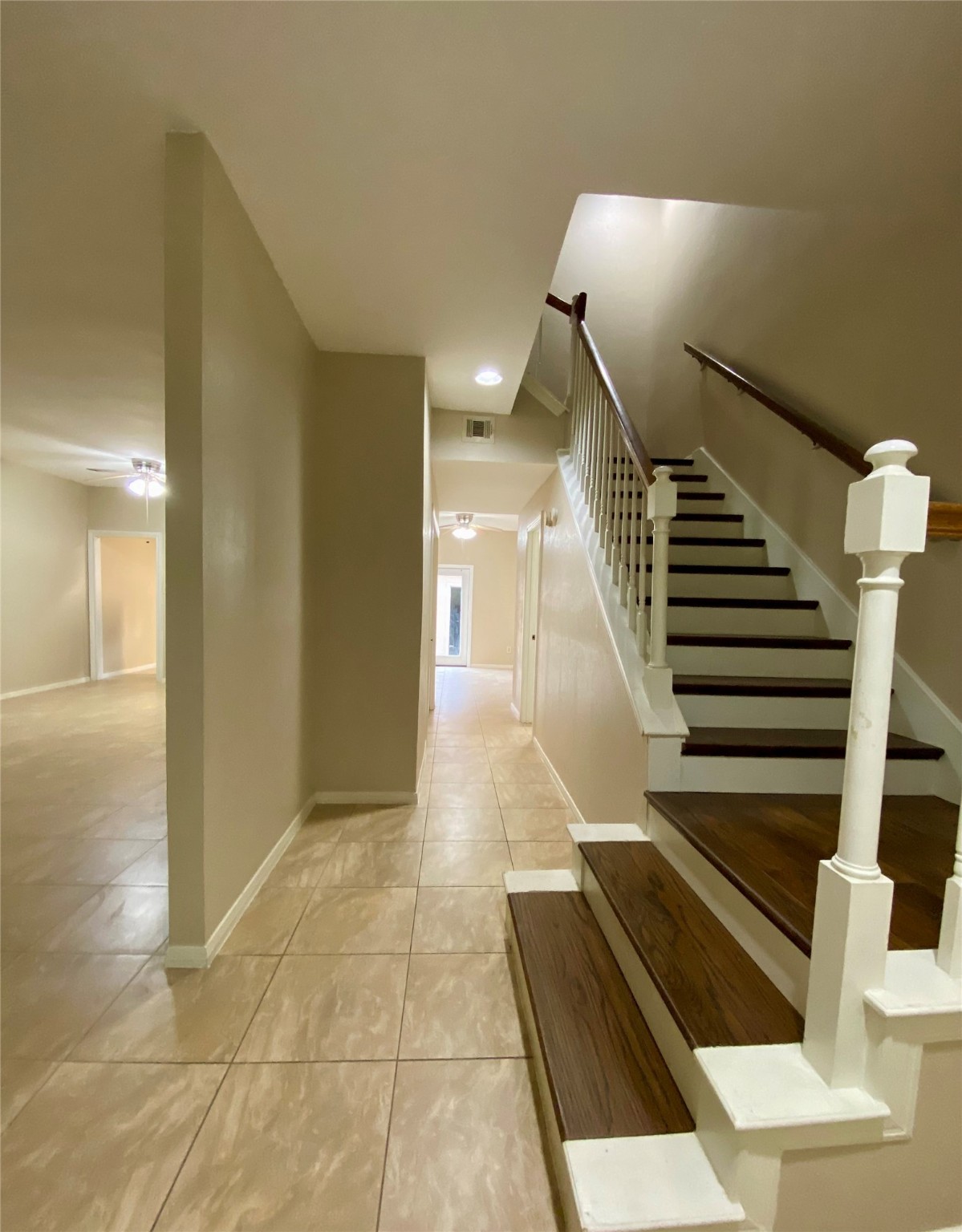 752 Augusta Drive Houston, TX 77057 - Photo 8 of 39 a view of entryway and hall with wooden floor