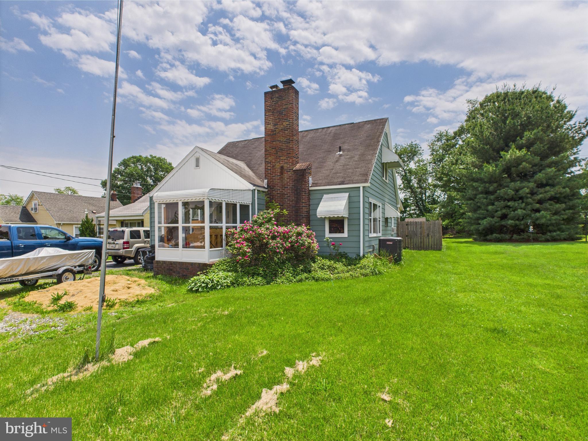 1207 Orems Road Baltimore, MD 21220 - Photo 1 of 33 a front view of a house with garden