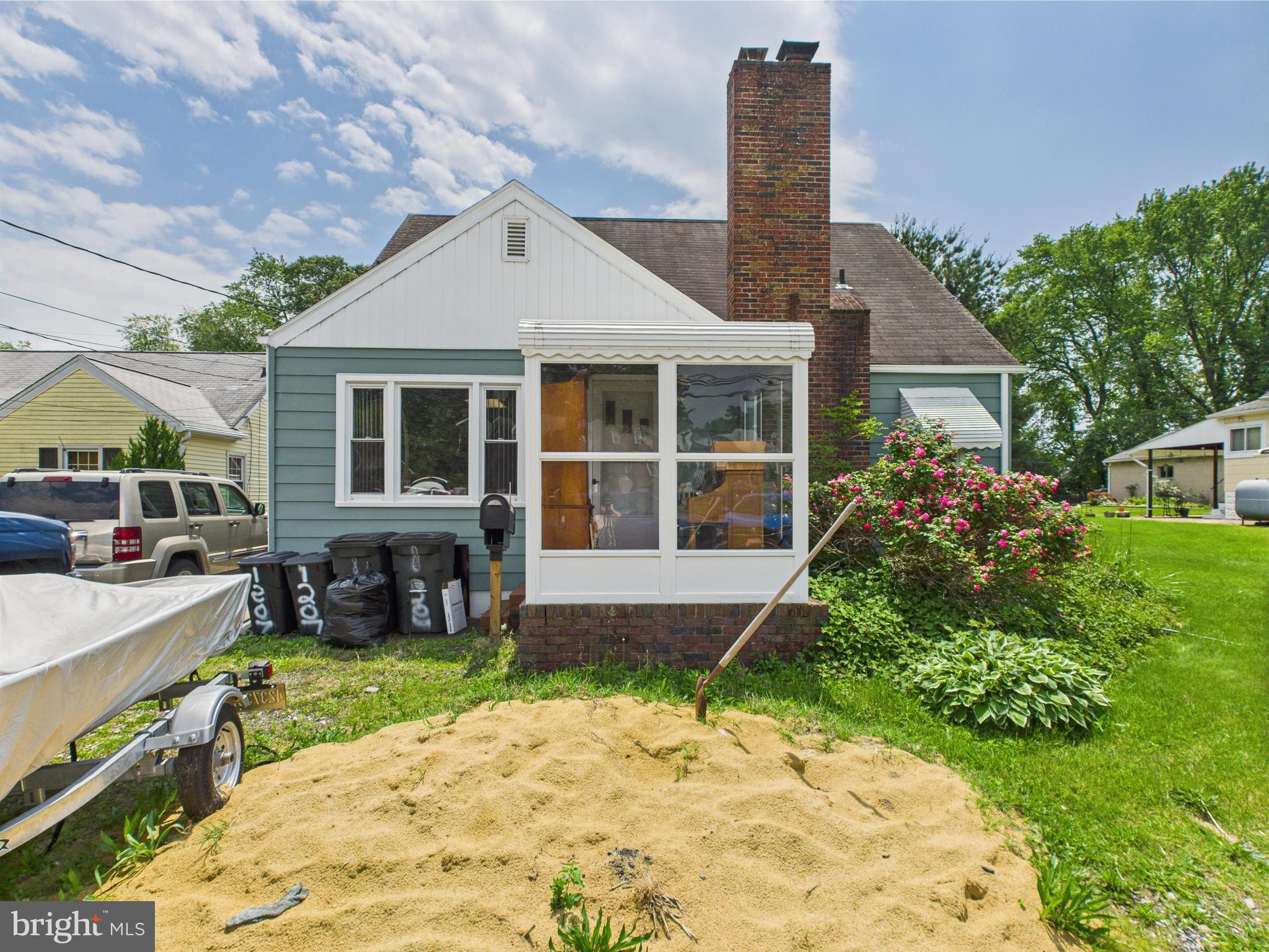 1207 Orems Road Baltimore, MD 21220 - Photo 2 of 33 a front view of a house with a garden and yard