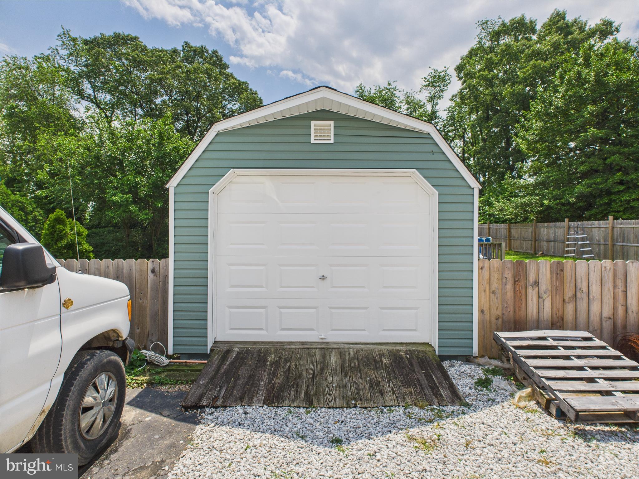 1207 Orems Road Baltimore, MD 21220 - Photo 21 of 33 a front view of a house with parking area