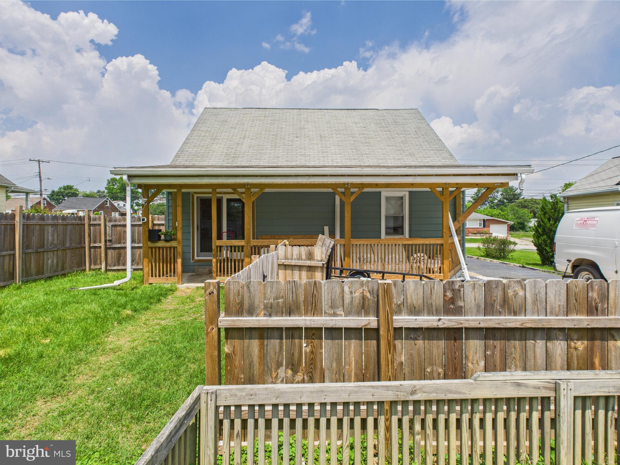 1207 Orems Road Baltimore, MD 21220 - Photo 23 of 33 a view of a house with backyard and porch
