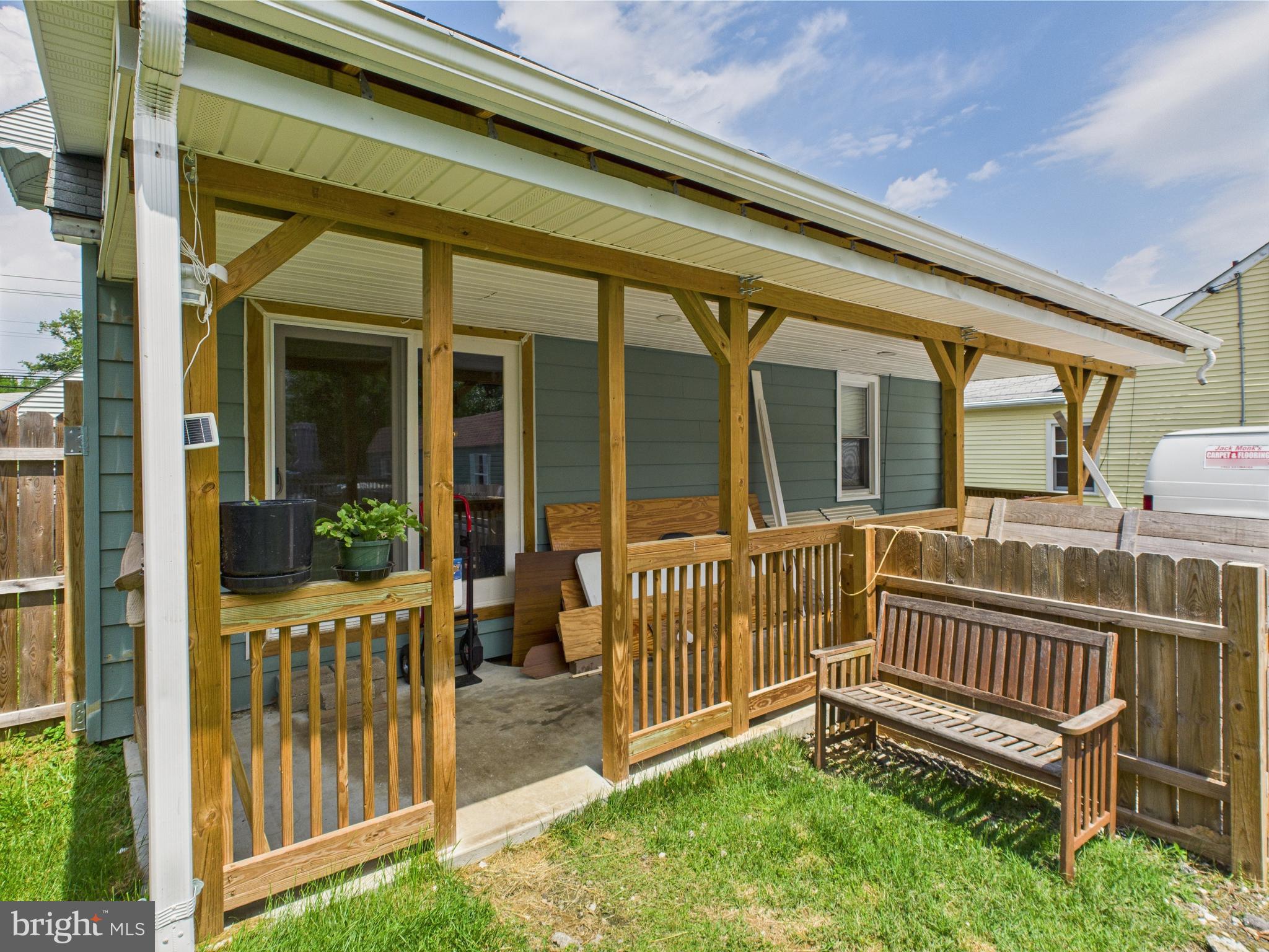 1207 Orems Road Baltimore, MD 21220 - Photo 24 of 33 a view of a house with porch and wooden floor