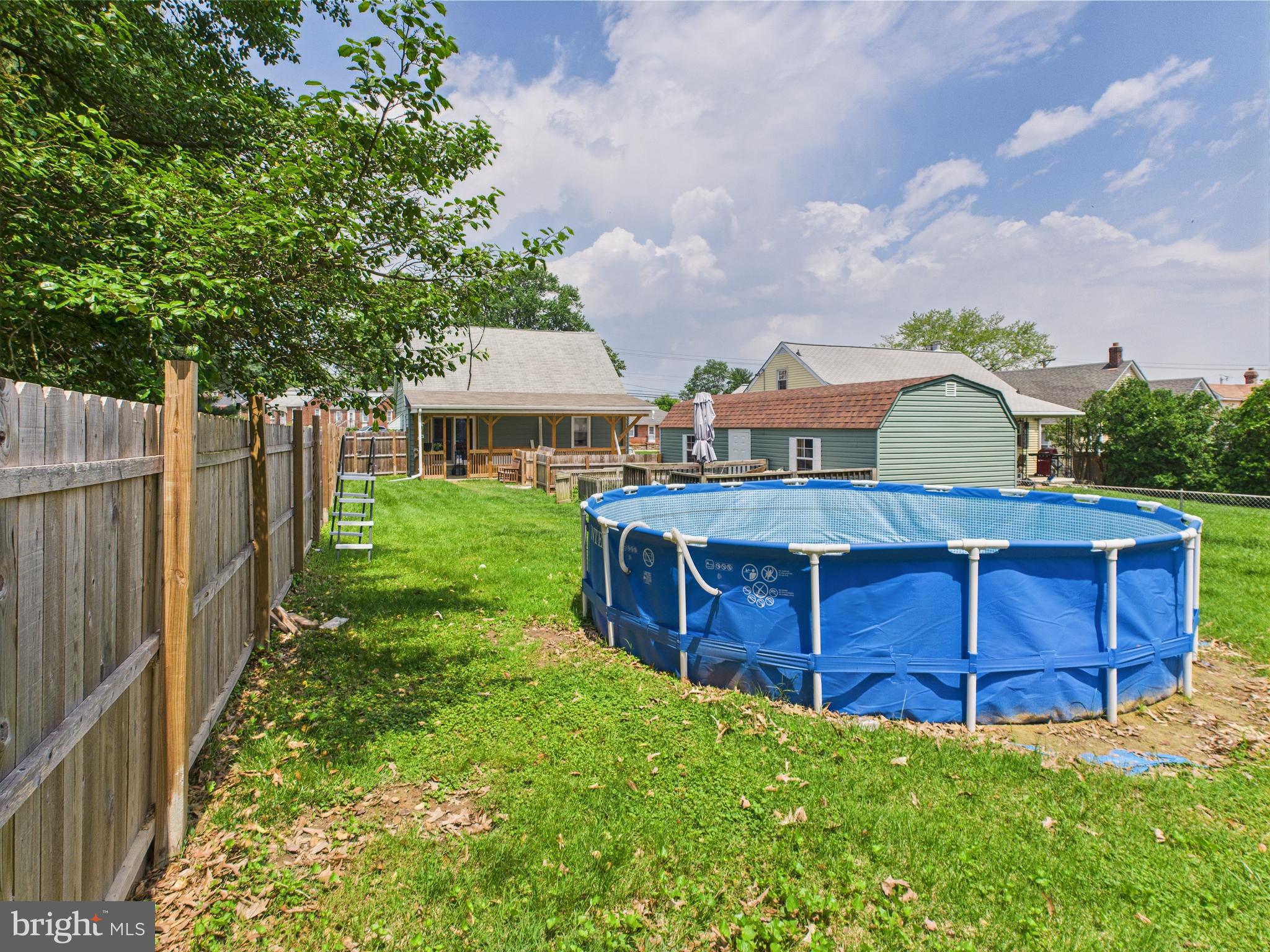 1207 Orems Road Baltimore, MD 21220 - Photo 28 of 33 a view of a backyard with wooden fence