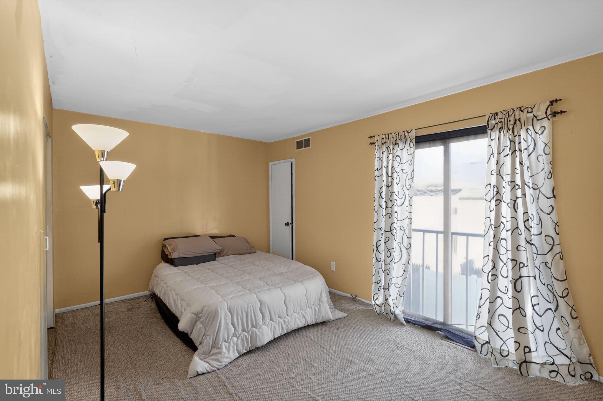 285 Via Cascata Drive Clementon, NJ 08021 - Photo 11 of 15 a bedroom with a bed and a window