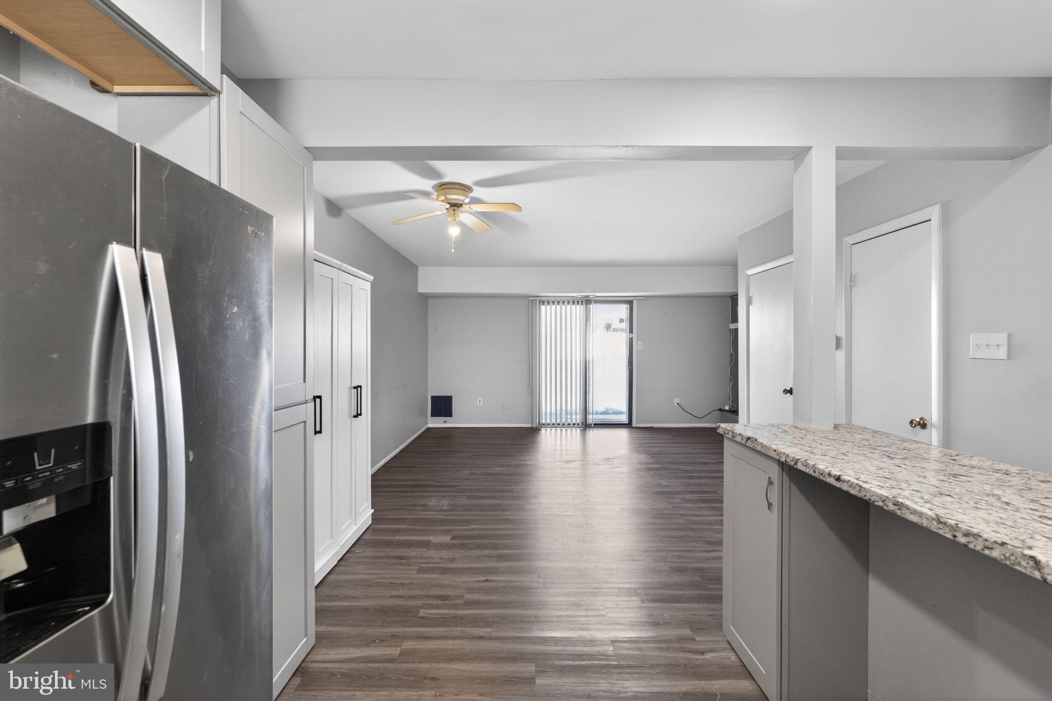 285 Via Cascata Drive Clementon, NJ 08021 - Photo 6 of 15 a view of a hallway with wooden floor and staircase
