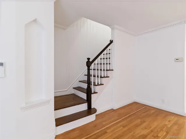 a view of entryway with wooden floor