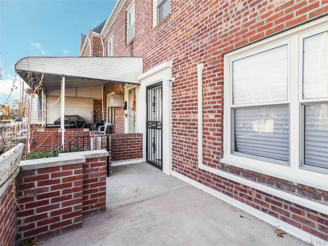 a view of a house with a porch